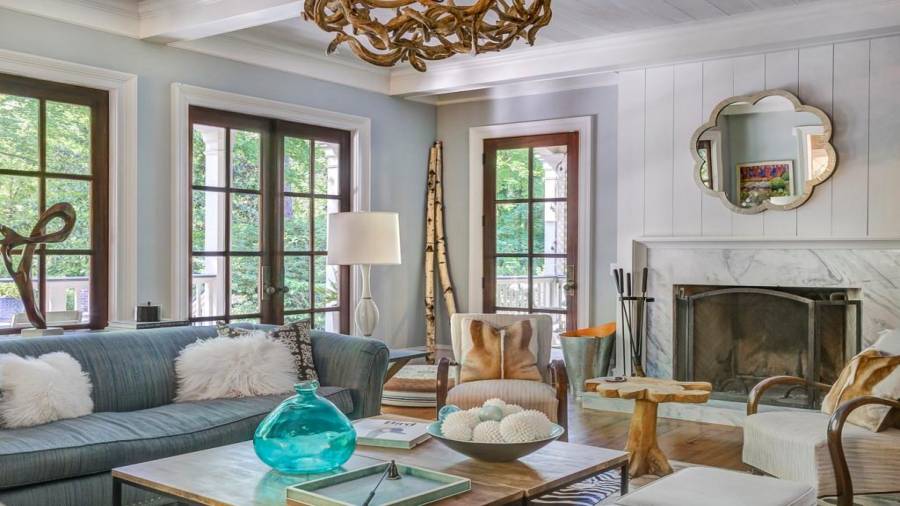 Family room has multiple doors to back covered porch.