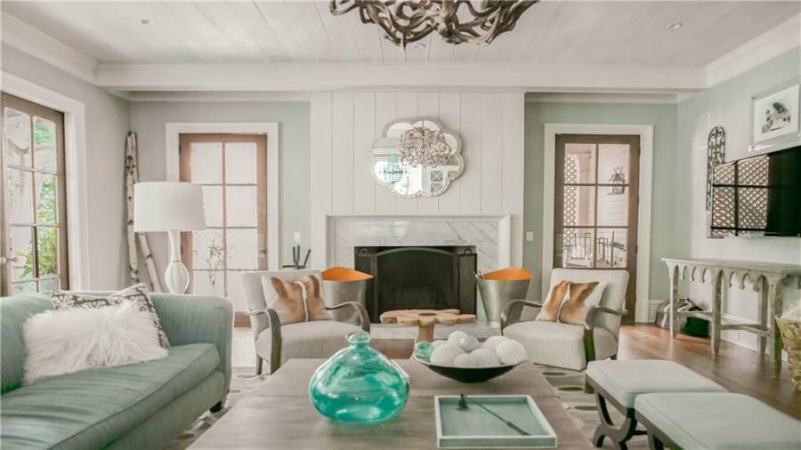 Wood brining fireplace has perfect wood storage behind for easy access.