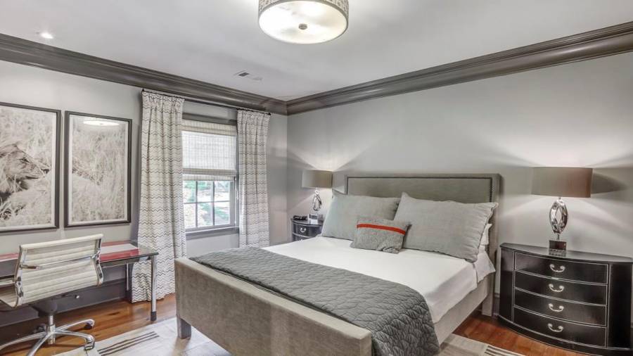 A second upstairs guest bedroom with ensuite bathroom.