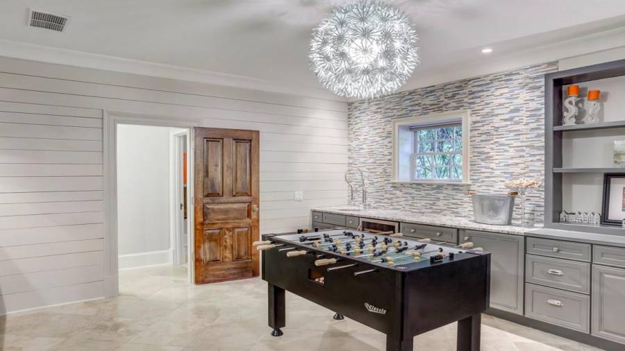 Basement room is large enough for game table and living room (not pictured) - or make huge guest suite with separate entrance. Ensuite bath and laundry through door.