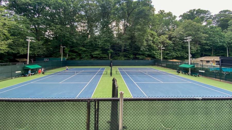 Private hard court tennis courts at the club.