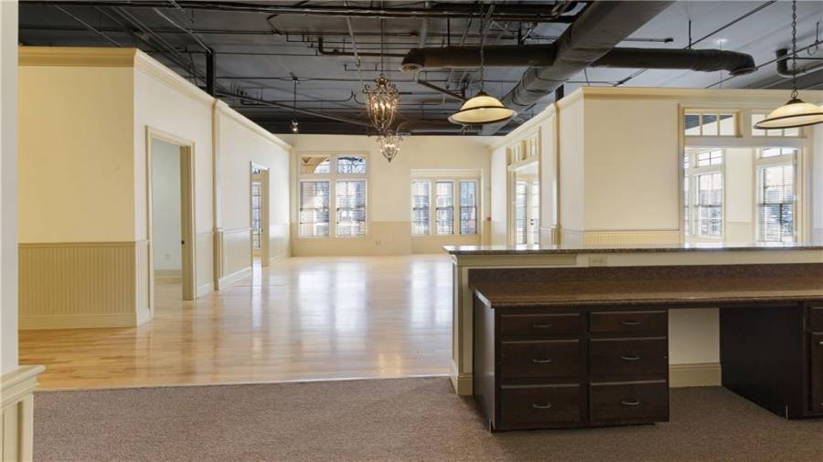View of the large center common area, with doors leading to the Town Green
