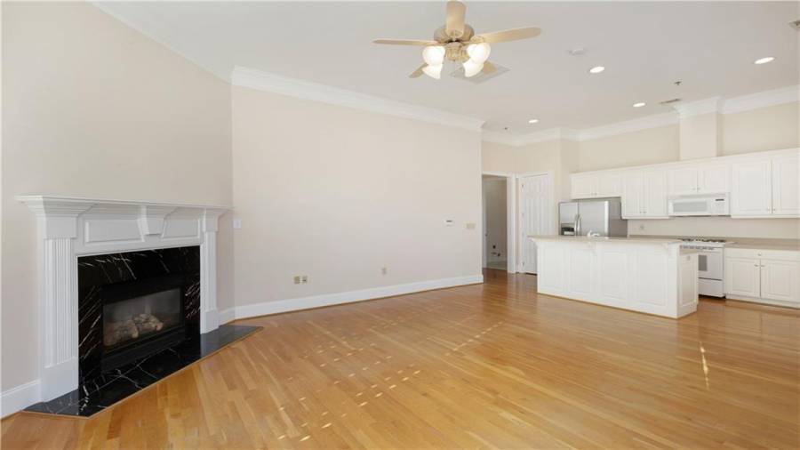 Upstairs condo Unit 1 family room to kitchen