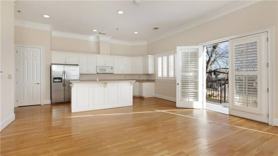 Upstairs condo Unit 1 family room to kitchen