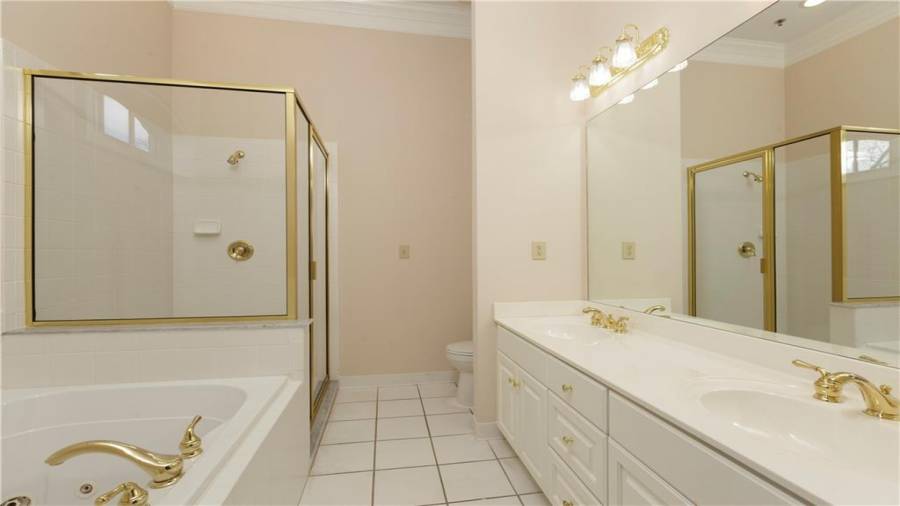 Upstairs condo Unit 1 primary bathroom