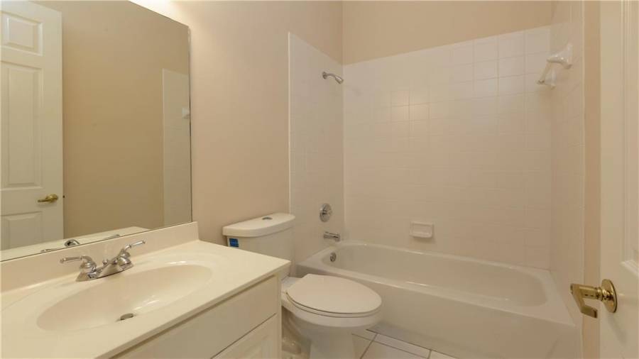 Upstairs condo Unit 1 secondary bathroom