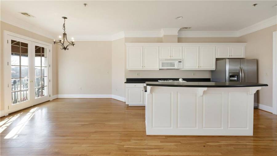 Upstairs condo Unit 2 kitchen with eat-in area
