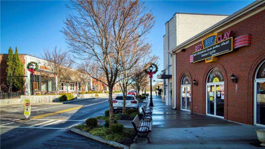 Various restaurants, retail stores and entertainment venues are in the Town Green walking area