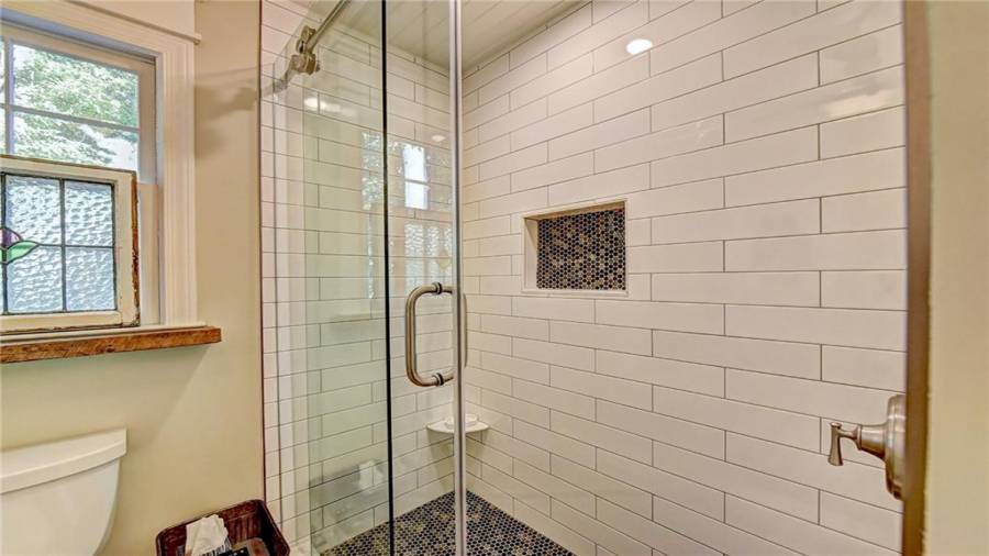 Bathroom 2 new subway tile - frameless shower door.