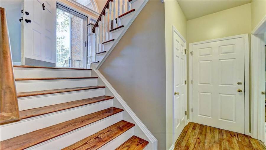 Split Foyer - Steps to basement - Storage under stairs - Door to garage - laundry room to right