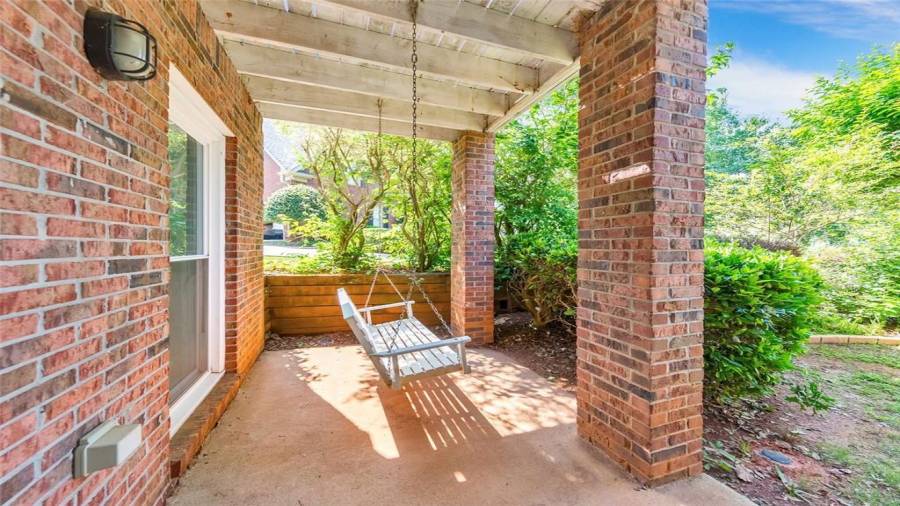 Swing overlooking the backyard!