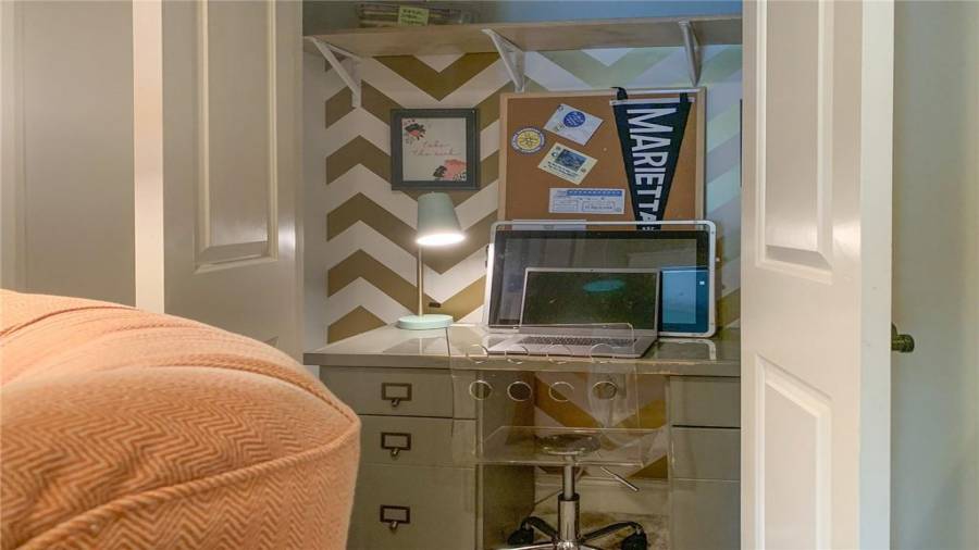 Landing Closet with Childs Desk Set up