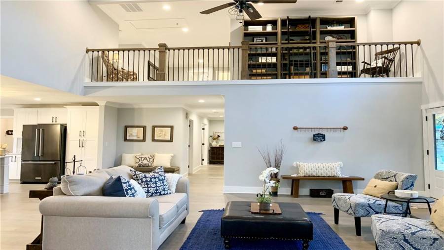 Kids can play or study in huge area upstairs while adults lounge in the living room, dining room, & kitchen