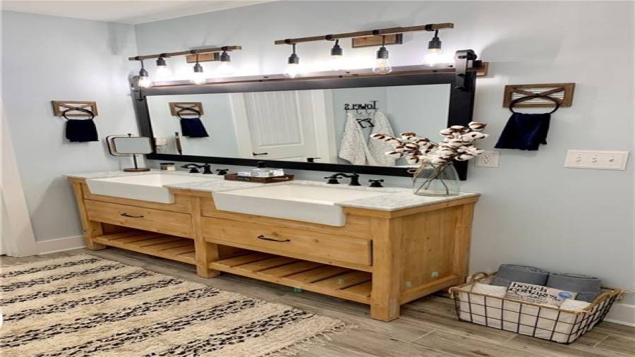 Unique farmhouse sink vanity cabinet and sliding barn door style mirror!