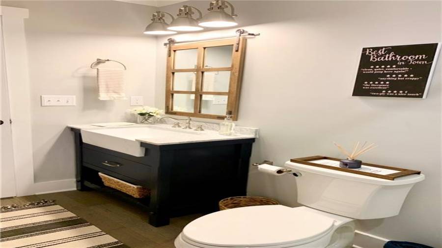 Custom accents make this a truly unique guest bath!