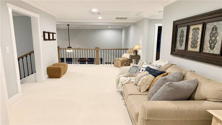 Enormous open area upstairs perfect for play/study area with view to kitchen, living, & dining rooms