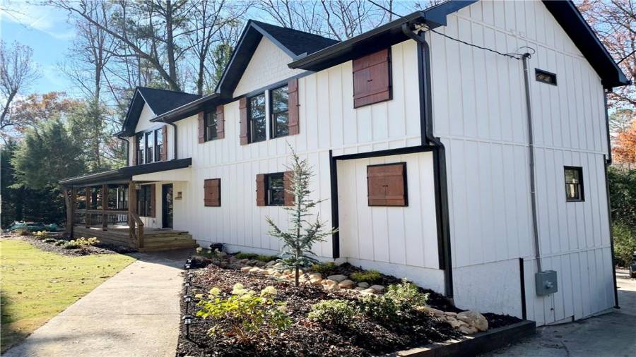 Professionally landscaped with lovely blue atlas cedar tree & zen zoysia sod