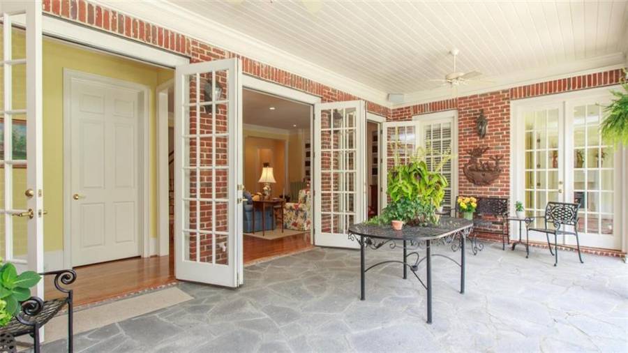 Living Room opens to large covered patio with access to Pool Bath and Master Sun Room