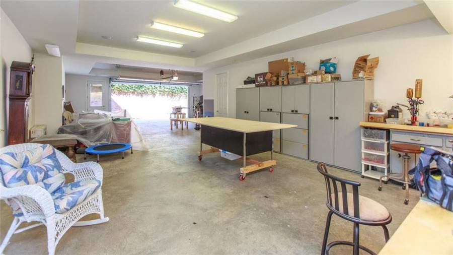 Large Conditioned Shop area.  Can be utilized for additional Garage Space.