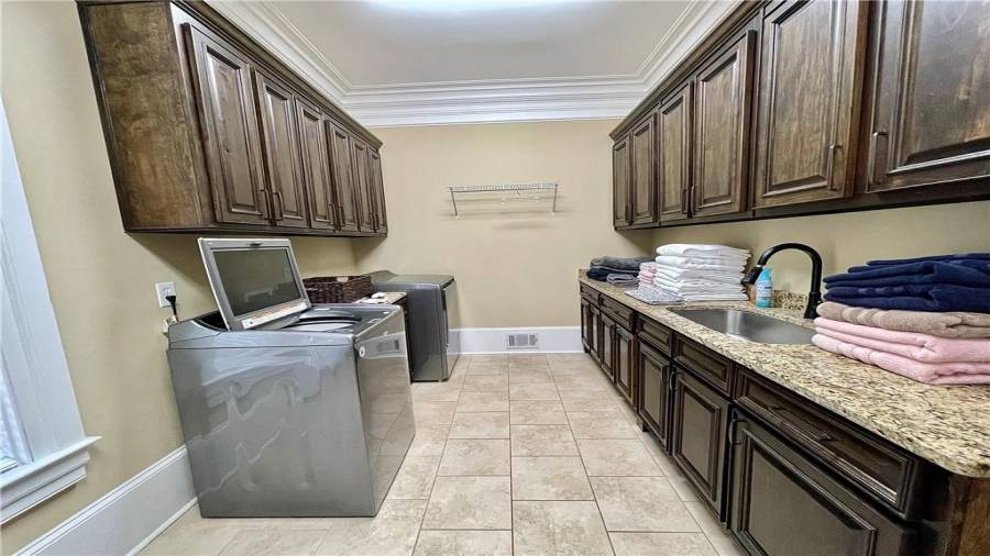 1st laundry room located on main level.  Large enough to maintain laundry for a week.