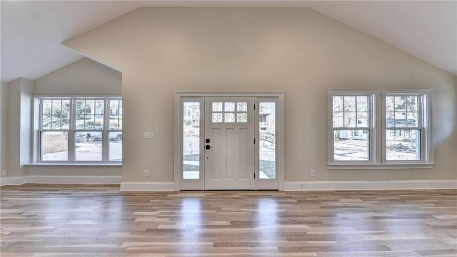 New white oak flooring, new windows, new roof, new mahogany front door, new stainless steel appliances, cabinets, counter tops