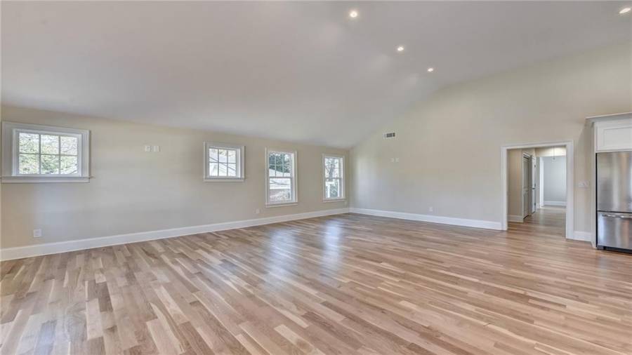 Open concept with an abundance of natural light throughout this magnificent home.