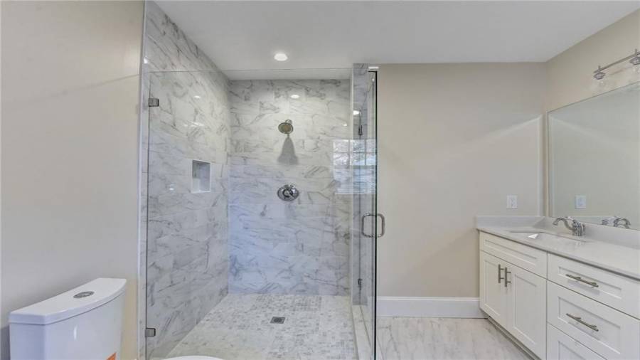 New glass shower in master bathroom