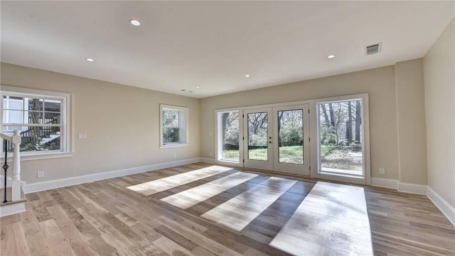 2nd living area in terrace level, family room, flex/office space, playroom or gym and walk out to the patio and private back yard and detached 2 car garage