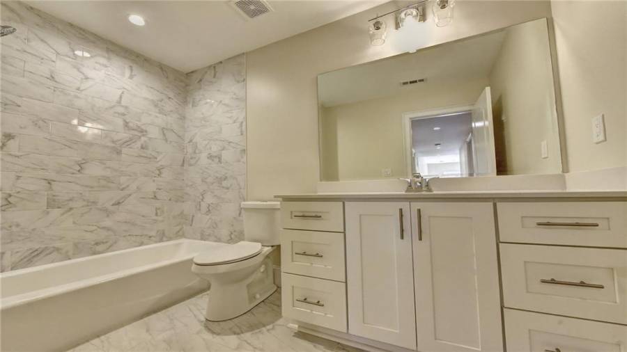 3rd full bathroom in terrace level, new designer, lighting and  cabinets