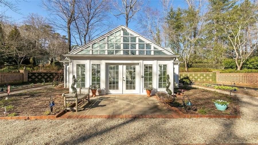 Side View of Green House and Vegetable Garden