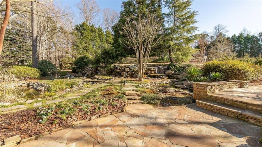 Hard Scapes with Waterfalls Leading to Recreation Area