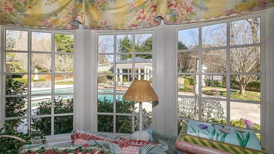Sunroom Overlooking Pool Area and Grounds
