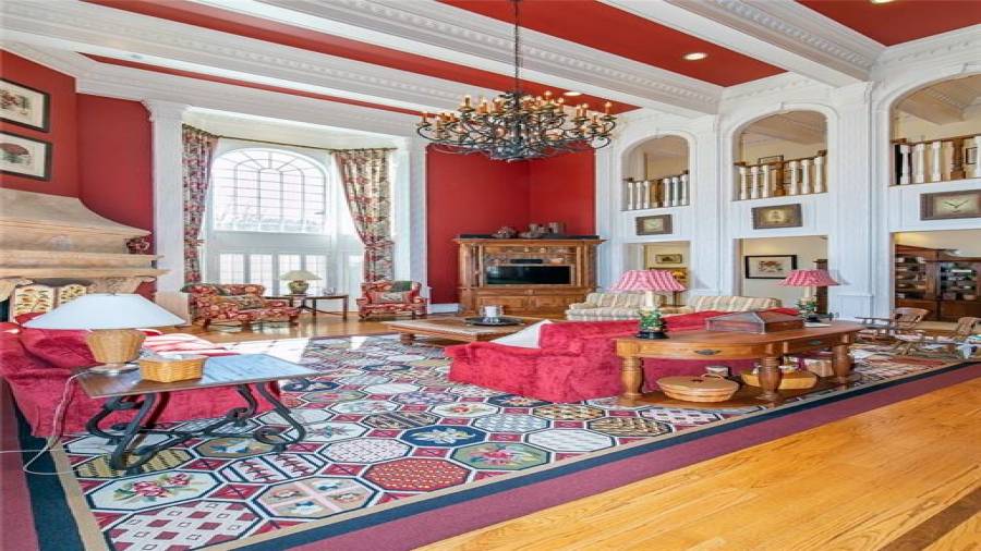 Architectural Ceilings with Chandelier and Massive Windows