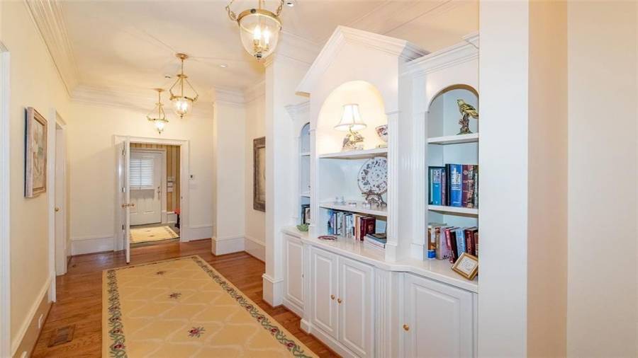 Hallway Leading to Additional Bedrooms and Office on Main Floor