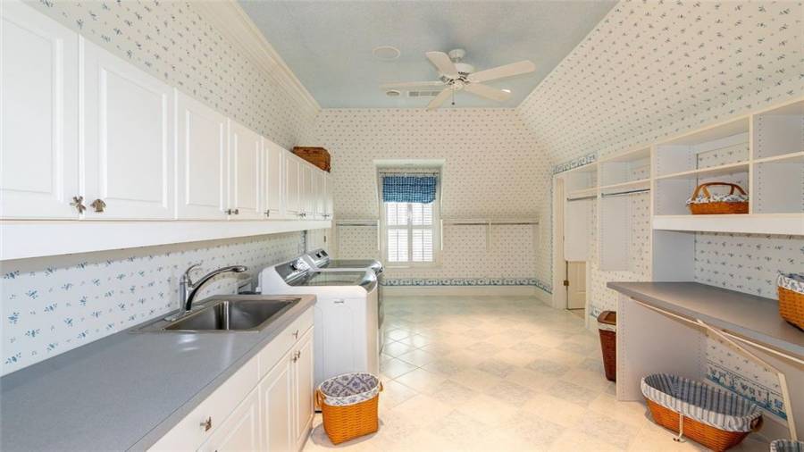 Laundry Room with Sink, Walk-up Attic, Central Vac, and Expanded Storage