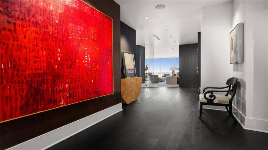 The large, stunning foyer leads to both the living or kitchen/den areas.