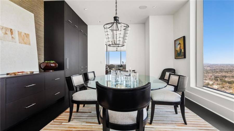 The Breakfast Room (Or Second Dining Room) Offers Beautiful Views and Well-Executed Built-Ins. This Room Was Used By the Previous Owner as Home Office.... allowing for His and Hers Home Offices In The Home.
