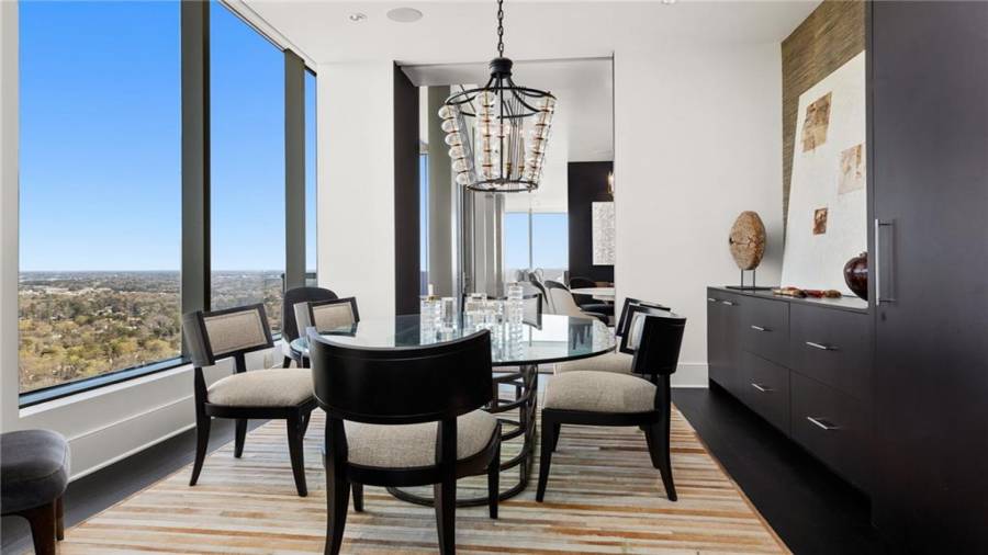 The Breakfast Room (Or Second Dining Room) Offers Beautiful Views and Well-Executed Built-Ins. This Room Was Used By the Previous Owner as Home Office.... allowing for His and Hers Home Offices In The Home.