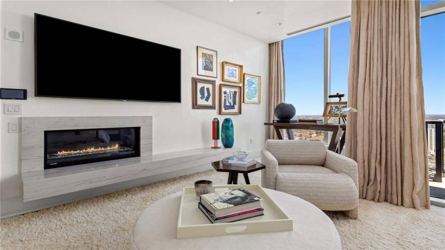 Master Bedroom Sitting Room Area With Natural Gas Fireplace.