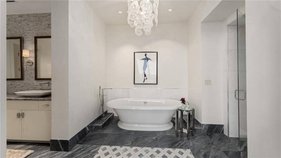 Fabulous Master Bath With Free Standing Soaking Tub. Steam Shower On Right.