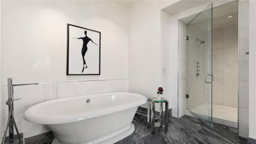 Grand Soaking Tub and Large Steam Shower On The Right.